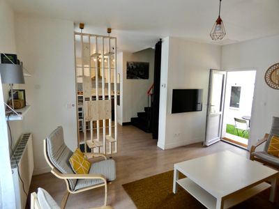 Espace de vie commun avec accès au patio